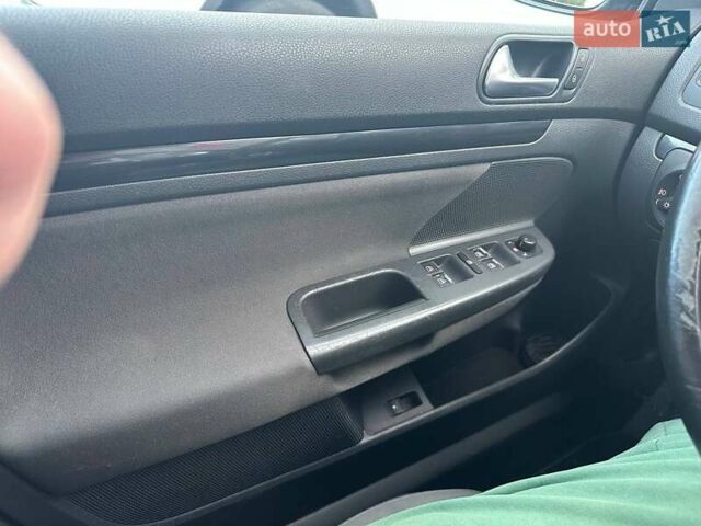 Фольксваген Гольф ГТИ 2006 в Днепре (Днепропетровске) на Automoto.ua Черный Фольксваген Гольф ГТИ, объемом двигателя 1.4 л и пробегом 204 тыс. км за 6400 $, фото 7 на Automoto.ua