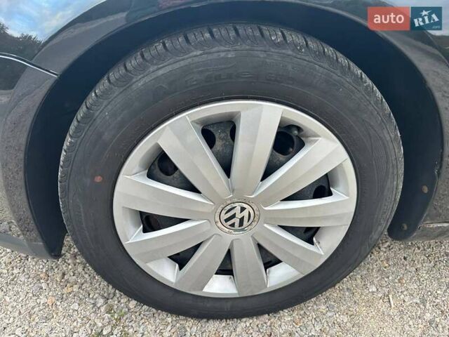 Фольксваген Гольф ГТИ 2006 в Днепре (Днепропетровске) на Automoto.ua Черный Фольксваген Гольф ГТИ, объемом двигателя 1.4 л и пробегом 204 тыс. км за 6400 $, фото 11 на Automoto.ua