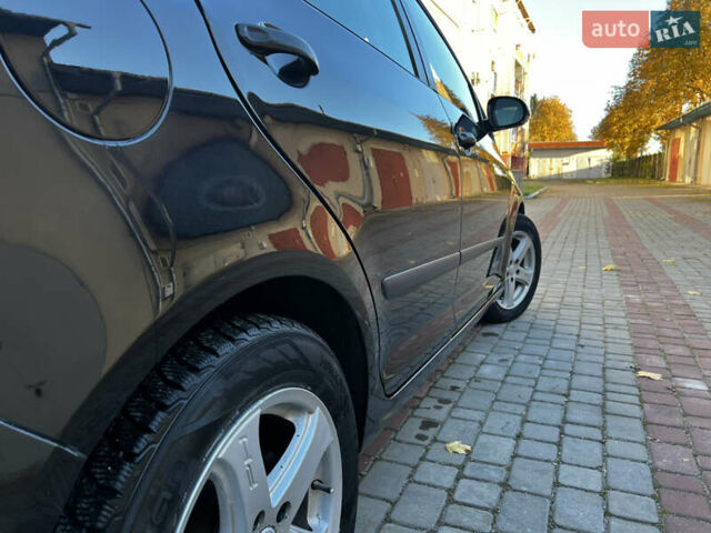 Черный Фольксваген Гольф Плюс, объемом двигателя 1.6 л и пробегом 230 тыс. км за 4950 $, фото 30 на Automoto.ua