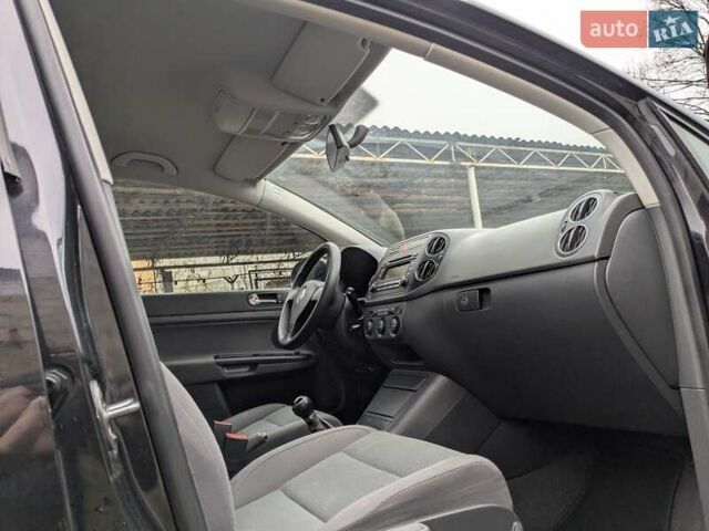 Черный Фольксваген Гольф Плюс, объемом двигателя 1.4 л и пробегом 218 тыс. км за 4850 $, фото 27 на Automoto.ua