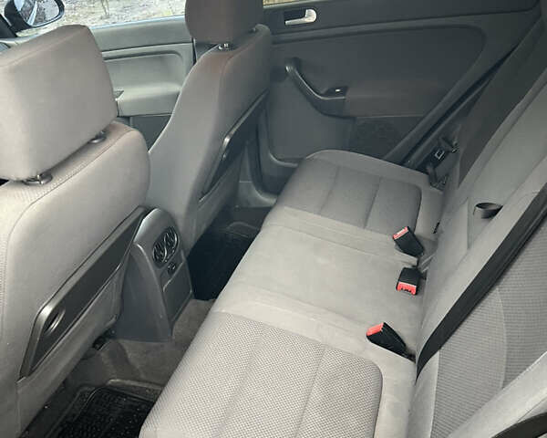 Черный Фольксваген Гольф Плюс, объемом двигателя 1.6 л и пробегом 301 тыс. км за 5999 $, фото 21 на Automoto.ua