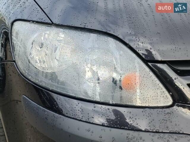 Черный Фольксваген Гольф Плюс, объемом двигателя 1.4 л и пробегом 298 тыс. км за 5780 $, фото 5 на Automoto.ua