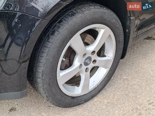 Черный Фольксваген Гольф Плюс, объемом двигателя 1.4 л и пробегом 298 тыс. км за 5780 $, фото 3 на Automoto.ua