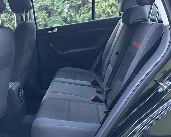 Черный Фольксваген Гольф Плюс, объемом двигателя 1.6 л и пробегом 203 тыс. км за 6300 $, фото 16 на Automoto.ua