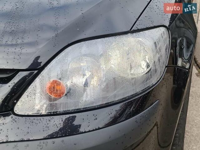 Черный Фольксваген Гольф Плюс, объемом двигателя 1.4 л и пробегом 298 тыс. км за 5780 $, фото 4 на Automoto.ua