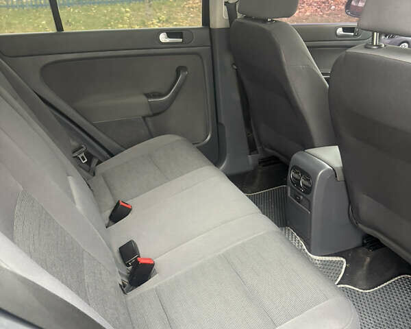 Черный Фольксваген Гольф Плюс, объемом двигателя 2 л и пробегом 207 тыс. км за 7500 $, фото 6 на Automoto.ua