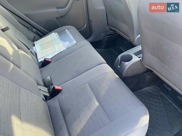 Черный Фольксваген Гольф Плюс, объемом двигателя 1.6 л и пробегом 193 тыс. км за 5999 $, фото 25 на Automoto.ua