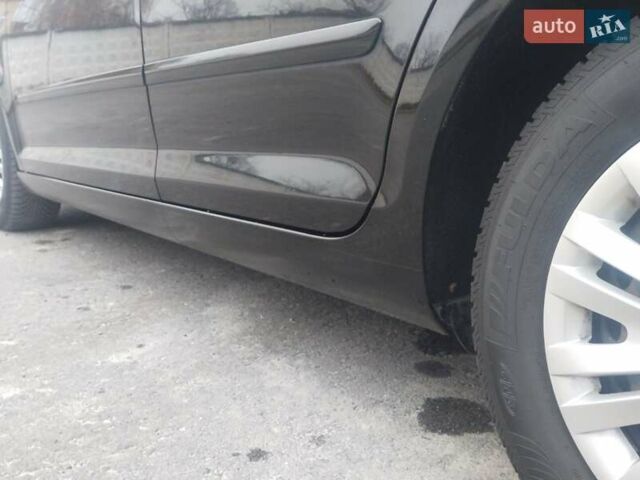 Черный Фольксваген Гольф Плюс, объемом двигателя 1.4 л и пробегом 152 тыс. км за 5999 $, фото 3 на Automoto.ua