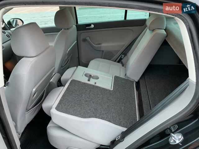 Черный Фольксваген Гольф Плюс, объемом двигателя 1.4 л и пробегом 218 тыс. км за 6700 $, фото 16 на Automoto.ua