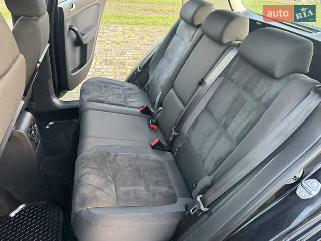 Черный Фольксваген Гольф Плюс, объемом двигателя 1.6 л и пробегом 147 тыс. км за 7950 $, фото 24 на Automoto.ua