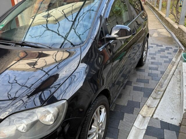 Черный Фольксваген Гольф Плюс, объемом двигателя 2 л и пробегом 229 тыс. км за 6379 $, фото 5 на Automoto.ua