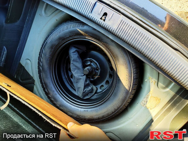 Черный Фольксваген Гольф Плюс, объемом двигателя 1.4 л и пробегом 195 тыс. км за 6799 $, фото 12 на Automoto.ua