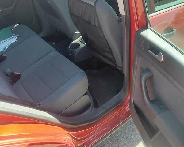 Красный Фольксваген Гольф Плюс, объемом двигателя 1.4 л и пробегом 210 тыс. км за 8300 $, фото 16 на Automoto.ua
