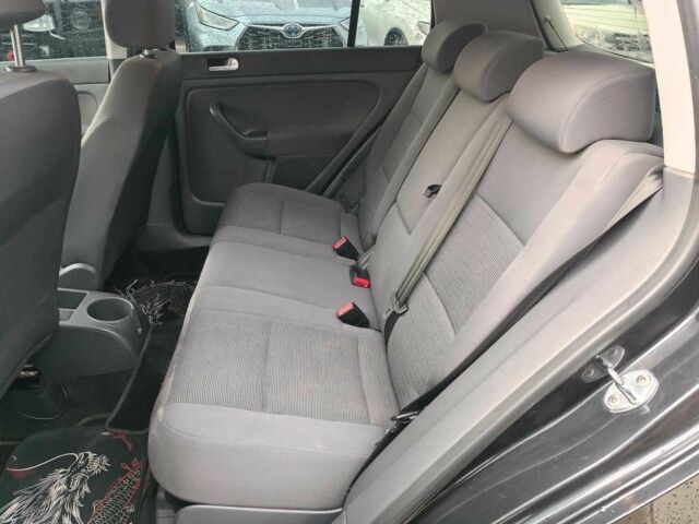 Красный Фольксваген Гольф Плюс, объемом двигателя 1.8 л и пробегом 298 тыс. км за 5780 $, фото 12 на Automoto.ua