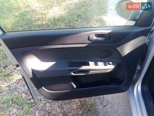 Серый Фольксваген Гольф Плюс, объемом двигателя 1.4 л и пробегом 220 тыс. км за 5500 $, фото 8 на Automoto.ua