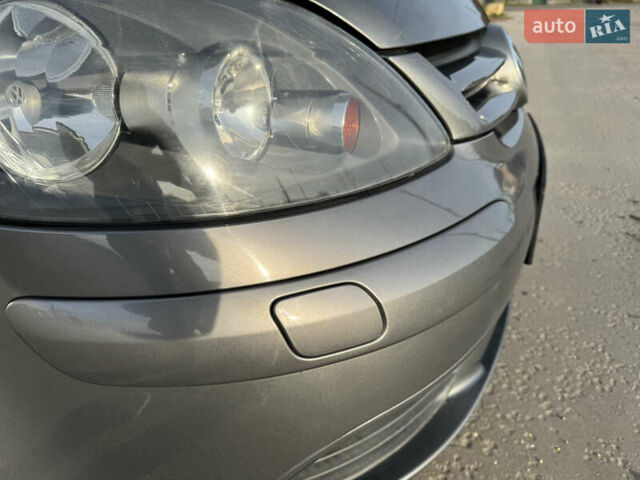 Серый Фольксваген Гольф Плюс, объемом двигателя 1.4 л и пробегом 174 тыс. км за 5650 $, фото 9 на Automoto.ua