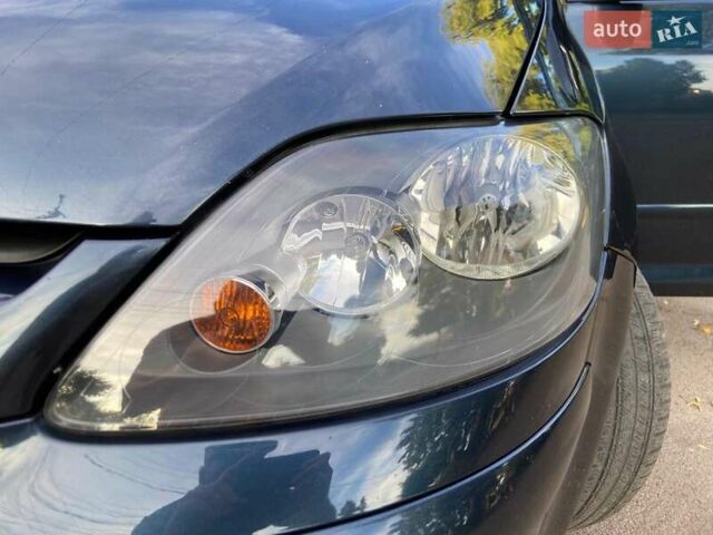 Серый Фольксваген Гольф Плюс, объемом двигателя 1.6 л и пробегом 197 тыс. км за 6300 $, фото 8 на Automoto.ua