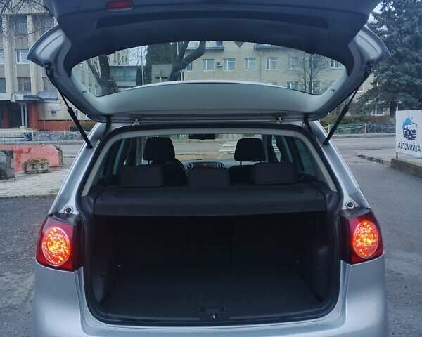 Серый Фольксваген Гольф Плюс, объемом двигателя 1.6 л и пробегом 240 тыс. км за 5999 $, фото 11 на Automoto.ua