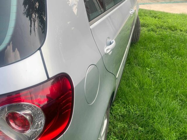 Серый Фольксваген Гольф Плюс, объемом двигателя 1.4 л и пробегом 175 тыс. км за 8300 $, фото 3 на Automoto.ua