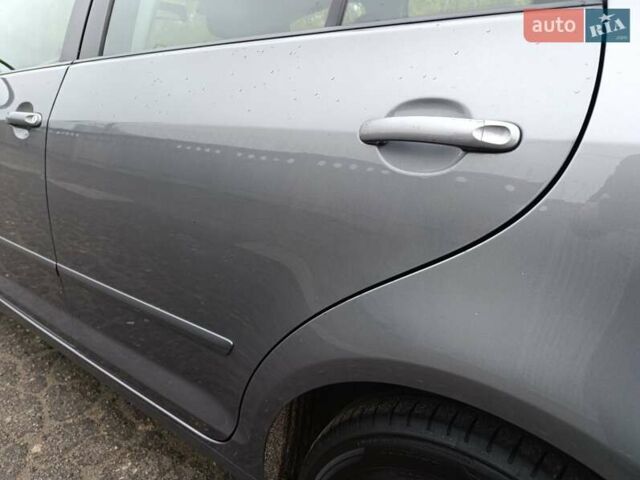 Серый Фольксваген Гольф Плюс, объемом двигателя 1.4 л и пробегом 200 тыс. км за 11650 $, фото 15 на Automoto.ua