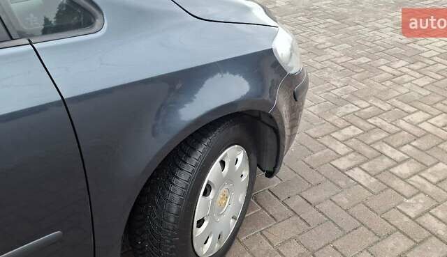 Синий Фольксваген Гольф Плюс, объемом двигателя 1.6 л и пробегом 229 тыс. км за 5000 $, фото 13 на Automoto.ua