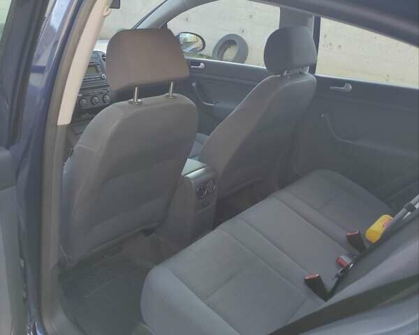 Синий Фольксваген Гольф Плюс, объемом двигателя 1.4 л и пробегом 215 тыс. км за 5400 $, фото 28 на Automoto.ua