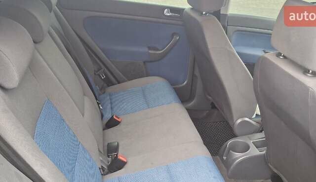 Синий Фольксваген Гольф Плюс, объемом двигателя 1.6 л и пробегом 229 тыс. км за 5000 $, фото 4 на Automoto.ua