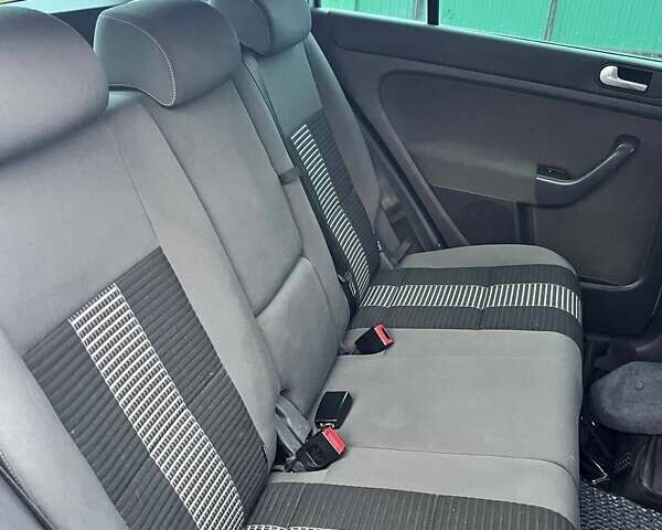 Синий Фольксваген Гольф Плюс, объемом двигателя 1.4 л и пробегом 181 тыс. км за 6600 $, фото 12 на Automoto.ua