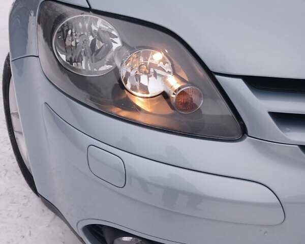 Синий Фольксваген Гольф Плюс, объемом двигателя 1.4 л и пробегом 170 тыс. км за 7800 $, фото 12 на Automoto.ua