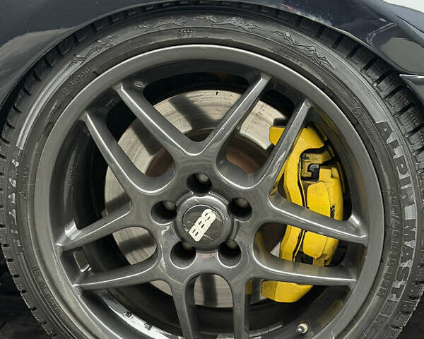 Чорний Фольксваген Гольф Р, об'ємом двигуна 2 л та пробігом 240 тис. км за 11000 $, фото 5 на Automoto.ua