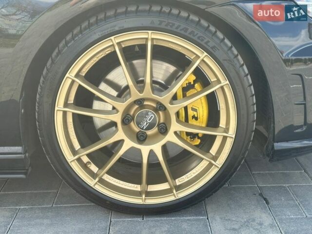 Черный Фольксваген Гольф Р, объемом двигателя 2 л и пробегом 130 тыс. км за 20000 $, фото 9 на Automoto.ua