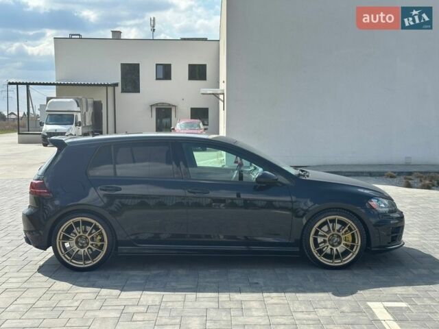 Черный Фольксваген Гольф Р, объемом двигателя 2 л и пробегом 130 тыс. км за 20000 $, фото 5 на Automoto.ua