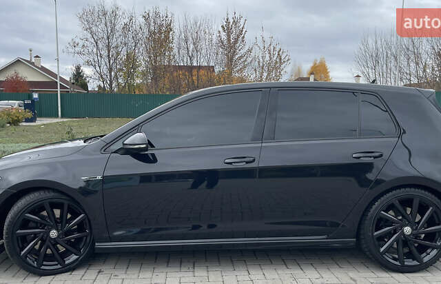 Чорний Фольксваген Гольф Р, об'ємом двигуна 2 л та пробігом 99 тис. км за 20999 $, фото 6 на Automoto.ua