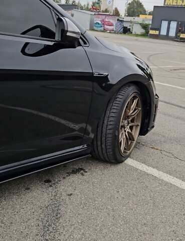 Черный Фольксваген Гольф Р, объемом двигателя 2 л и пробегом 141 тыс. км за 18500 $, фото 8 на Automoto.ua