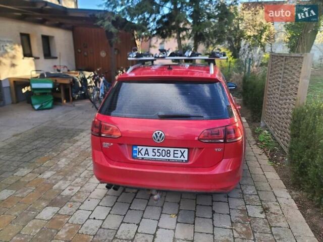 Красный Фольксваген Гольф Спортсван, объемом двигателя 2 л и пробегом 140 тыс. км за 15000 $, фото 1 на Automoto.ua