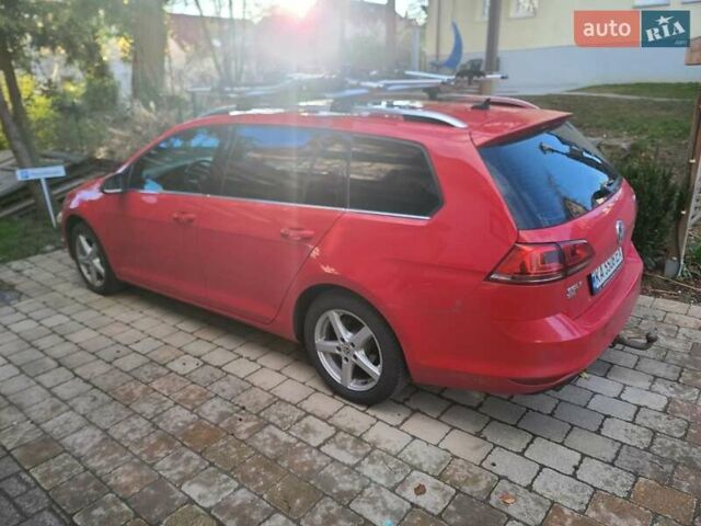 Красный Фольксваген Гольф Спортсван, объемом двигателя 2 л и пробегом 140 тыс. км за 15000 $, фото 2 на Automoto.ua