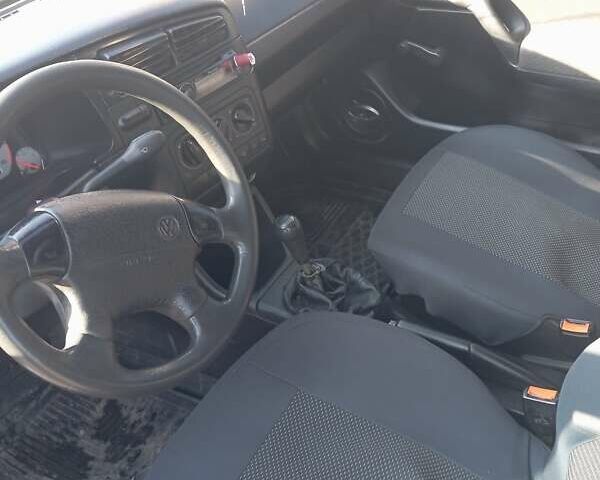 Білий Фольксваген Гольф, об'ємом двигуна 1.39 л та пробігом 93 тис. км за 2000 $, фото 5 на Automoto.ua