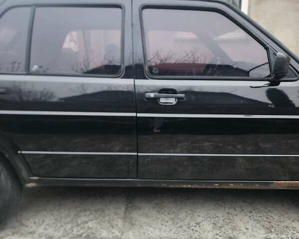 Черный Фольксваген Гольф, объемом двигателя 1.27 л и пробегом 485 тыс. км за 2100 $, фото 2 на Automoto.ua