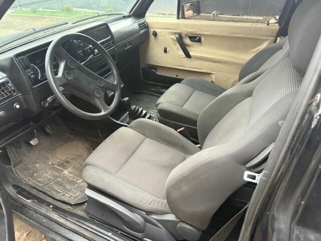 Черный Фольксваген Гольф, объемом двигателя 1.3 л и пробегом 211 тыс. км за 850 $, фото 3 на Automoto.ua