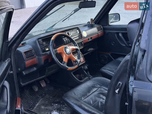 Черный Фольксваген Гольф, объемом двигателя 1.8 л и пробегом 100 тыс. км за 1000 $, фото 6 на Automoto.ua