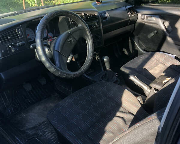 Черный Фольксваген Гольф, объемом двигателя 1.39 л и пробегом 233 тыс. км за 1100 $, фото 6 на Automoto.ua