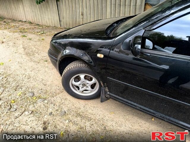 Черный Фольксваген Гольф, объемом двигателя 1.4 л и пробегом 224 тыс. км за 3700 $, фото 4 на Automoto.ua