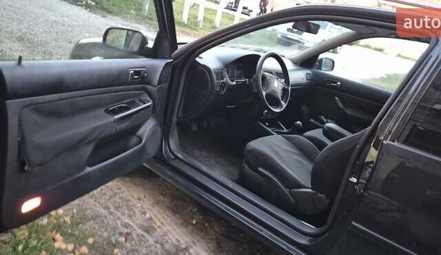 Черный Фольксваген Гольф, объемом двигателя 1.78 л и пробегом 300 тыс. км за 3900 $, фото 2 на Automoto.ua