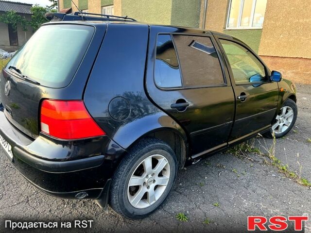 Черный Фольксваген Гольф, объемом двигателя 1.4 л и пробегом 400 тыс. км за 2800 $, фото 2 на Automoto.ua