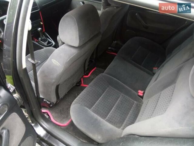 Черный Фольксваген Гольф, объемом двигателя 1.6 л и пробегом 264 тыс. км за 4000 $, фото 14 на Automoto.ua