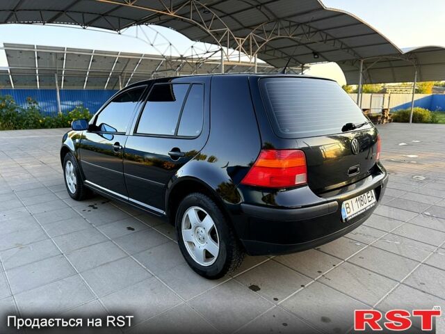 Черный Фольксваген Гольф, объемом двигателя 1.4 л и пробегом 200 тыс. км за 4250 $, фото 5 на Automoto.ua