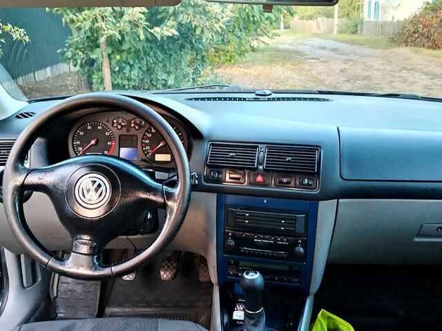 Черный Фольксваген Гольф, объемом двигателя 1.4 л и пробегом 233 тыс. км за 4100 $, фото 5 на Automoto.ua