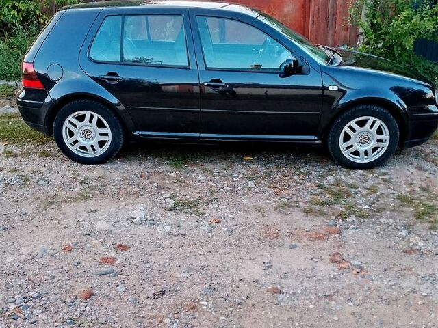 Черный Фольксваген Гольф, объемом двигателя 1.4 л и пробегом 233 тыс. км за 4100 $, фото 1 на Automoto.ua