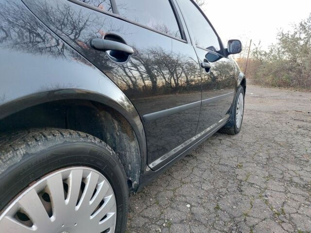 Черный Фольксваген Гольф, объемом двигателя 1.6 л и пробегом 221 тыс. км за 3900 $, фото 18 на Automoto.ua