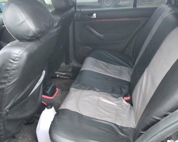 Черный Фольксваген Гольф, объемом двигателя 1.6 л и пробегом 287 тыс. км за 4000 $, фото 3 на Automoto.ua